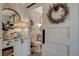 Stylish bathroom with barn door and patterned tile floor at 330 Shadybrook Ln # D, Las Vegas, NV 89107