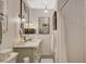 Bathroom with white subway tile and a marble vanity at 330 Shadybrook Ln # D, Las Vegas, NV 89107