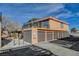 Building exterior with attached garages and private balconies at 330 Shadybrook Ln # D, Las Vegas, NV 89107