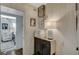 Bright hallway with linen closet and charming decor at 330 Shadybrook Ln # D, Las Vegas, NV 89107