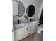 Modern bathroom with double vanity and grey marble countertop at 3414 Mount Charleston Dr, Pahrump, NV 89048