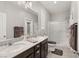 Double vanity bathroom with a large walk-in shower at 3484 Bradano Ln, Henderson, NV 89044