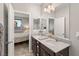 Double vanity bathroom with a view of a bedroom at 3484 Bradano Ln, Henderson, NV 89044