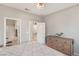 Bright bedroom with ensuite bathroom and dresser at 3484 Bradano Ln, Henderson, NV 89044