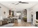 Modern kitchen with dark cabinets and island at 3484 Bradano Ln, Henderson, NV 89044