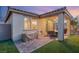 Covered patio with seating area and brick pavers at 3484 Bradano Ln, Henderson, NV 89044