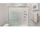 Shower stall with glass door and built-in shelving at 3484 Bradano Ln, Henderson, NV 89044