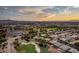 Aerial view of community near golf course and lake at 3514 Old Course St, Las Vegas, NV 89122