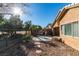 Home exterior showcasing a side yard with gravel at 3514 Old Course St, Las Vegas, NV 89122