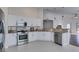 Updated kitchen featuring stainless steel appliances and granite countertops at 3514 Old Course St, Las Vegas, NV 89122