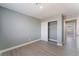 This bedroom features gray walls, closet with sliding doors, and modern flooring creating a comfortable space at 3802 Terrazzo Ave, Las Vegas, NV 89115