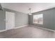 Bedroom featuring wood-look floors, a ceiling fan, and a window at 3802 Terrazzo Ave, Las Vegas, NV 89115