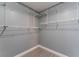 Interior view of the closet with built-in metal shelving and light gray walls at 3802 Terrazzo Ave, Las Vegas, NV 89115