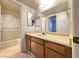 Bathroom featuring an extended vanity and a shower and tub combination at 3811 Desert Marina Dr # 132, Laughlin, NV 89029