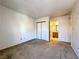 Bedroom with carpet, double door closet and access to bathroom at 3811 Desert Marina Dr # 132, Laughlin, NV 89029