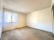 Bedroom with window and lace curtains at 3811 Desert Marina Dr # 132, Laughlin, NV 89029