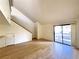 Light-filled living area with wood floors and sliding glass doors to the patio at 3811 Desert Marina Dr # 132, Laughlin, NV 89029