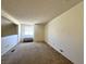 Carpeted loft area with window seat and natural light perfect for relaxing or a home office at 3811 Desert Marina Dr # 132, Laughlin, NV 89029