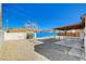 Backyard features a covered patio and gravel ground at 4524 Fulton Pl, Las Vegas, NV 89107