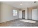 Bright bedroom with tile floors and a spacious closet at 4524 Fulton Pl, Las Vegas, NV 89107