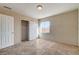 Spacious bedroom with tile floors and closet at 4524 Fulton Pl, Las Vegas, NV 89107