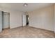 Simple bedroom with tile floors and closet at 4524 Fulton Pl, Las Vegas, NV 89107