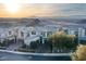 Aerial view of luxury homes with stunning mountain views and desert landscape at 49 Vista Outlook St, Henderson, NV 89011