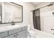 Modern bathroom with gray vanity and walk-in shower at 49 Vista Outlook St, Henderson, NV 89011