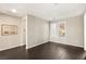 Empty bedroom with dark wood flooring and large windows at 49 Vista Outlook St, Henderson, NV 89011