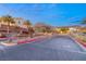 Gated community entrance with modern signage and desert landscaping at 49 Vista Outlook St, Henderson, NV 89011