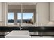 Farmhouse sink with city views from kitchen window at 49 Vista Outlook St, Henderson, NV 89011