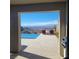 Stunning panoramic view from the patio, featuring a pool and cityscape at 49 Vista Outlook St, Henderson, NV 89011