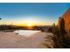 Inviting pool and patio area with sunset view at 49 Vista Outlook St, Henderson, NV 89011