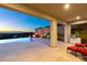 Covered patio with pool and city views at 49 Vista Outlook St, Henderson, NV 89011