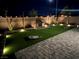 Landscaped backyard with grill and patio at 5773 Holbeche St, Las Vegas, NV 89113