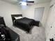 Well-lit bedroom featuring a comfortable bed at 5773 Holbeche St, Las Vegas, NV 89113