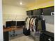 Large walk-in closet with shelving and hanging rods at 5773 Holbeche St, Las Vegas, NV 89113