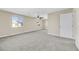 Spacious main bedroom with ceiling fan and large windows at 5912 Royal Castle Ln, Las Vegas, NV 89130