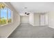 Main bedroom with ceiling fan and large windows offering natural light at 5912 Royal Castle Ln, Las Vegas, NV 89130