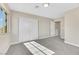 Well-lit bedroom with sliding door closet and carpet at 5912 Royal Castle Ln, Las Vegas, NV 89130