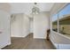 Light-filled dining area near entryway with hardwood floors at 5912 Royal Castle Ln, Las Vegas, NV 89130