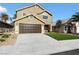 Two-story house with brown garage door and artificial turf at 5912 Royal Castle Ln, Las Vegas, NV 89130