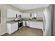 Well-lit kitchen with granite countertops and stainless steel appliances at 5912 Royal Castle Ln, Las Vegas, NV 89130