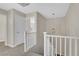 Upper level hallway showcasing a modern light fixture at 5912 Royal Castle Ln, Las Vegas, NV 89130