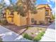 A charming condo building showcasing a well-maintained facade and manicured landscaping at 5915 Nuevo Leon St # 7, North Las Vegas, NV 89031