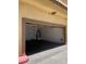 Attached single-car garage with interior access door at 5915 Nuevo Leon St # 7, North Las Vegas, NV 89031