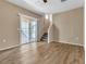 Inviting living room with stylish flooring and access to a private balcony at 5915 Nuevo Leon St # 7, North Las Vegas, NV 89031