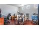 Inviting dining area featuring a table, chairs, and hardwood floors at 6287 Felicitas Ave, Las Vegas, NV 89122