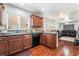 Modern kitchen with wood cabinets and granite countertops at 6287 Felicitas Ave, Las Vegas, NV 89122