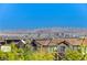 Aerial view showcasing community with mountain backdrop at 712 Rogue Wave St, Las Vegas, NV 89138